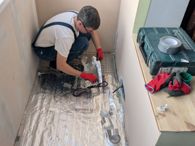 Эдуард и Мария из Томска вновь доверили монтаж тёплого пола «Буран»: профессиональная укладка Grandex MF на утеплённом балконе